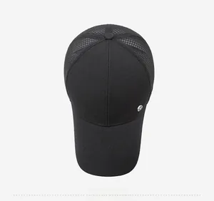 Detailed top view of a black mesh baseball cap showing breathable texture and logo