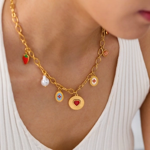 Gold chain necklace with strawberry, pearl, and red heart charms for women
