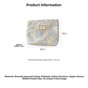 Detailed size specifications of light blue brocade floral makeup bag with 26x18x5cm dimensions
