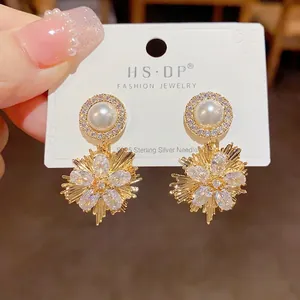 Sparkling gold flower dangle earrings with s925 silver needles and crystal zirconia