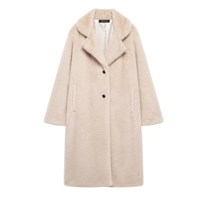 Detail showing high-quality beige faux fur texture and lapel design on this long coat