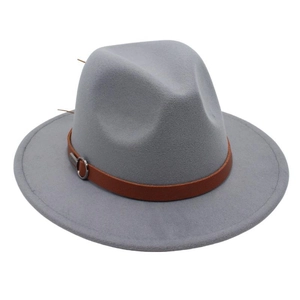 Detail of grey felt fedora hat featuring a brown leather band and silver metal buckle