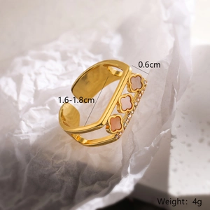 Macro detail of 18K gold plated clover ring showing 1.6-1.8cm diameter and 0.6cm width