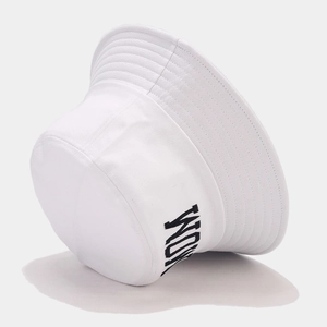 Detailed view of black WORK embroidery on a premium white cotton bucket hat