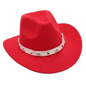 Detailed view of red wool felt cowboy hat with pearl and stud embellished band