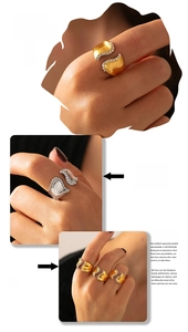 Close-up of 18k gold and silver irregular wave rings with micro-set zircons on hand