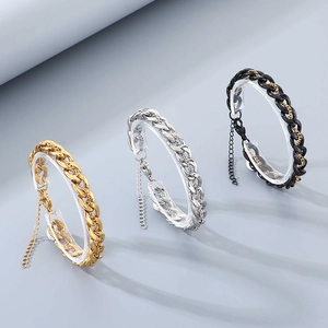 Three-piece set of street style Cuban link bracelets in gold, silver, and black finishes