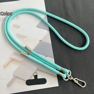 Detail of 8mm tiffany blue braided phone lanyard with silver metal clasp and black patch