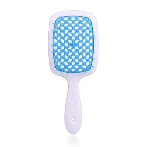 Detail of the blue honeycomb vented hairbrush with white handle for professional styling