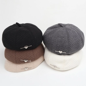 Herringbone beret hats in various colors with silver heart buckles and twill texture