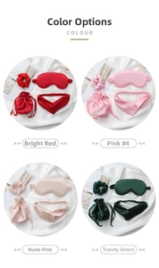 Detail view of four-piece satin sleep set including eye mask and scrunchies in various colors