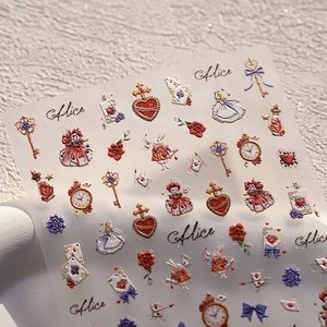 Vintage Alice in Wonderland nail stickers with rabbit, heart, and pocket watch patterns