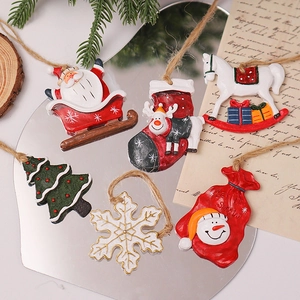Detailed view of vintage resin Christmas ornaments on a mirror with rustic pine and wood