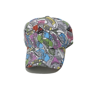 Detailed view of street style baseball cap with colorful sneaker graffiti print pattern