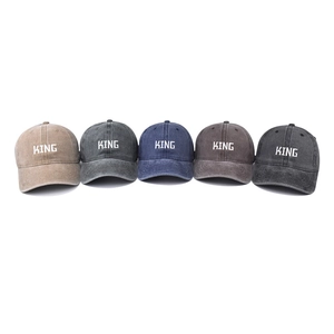 Five washed vintage baseball caps with white KING embroidery in assorted colors
