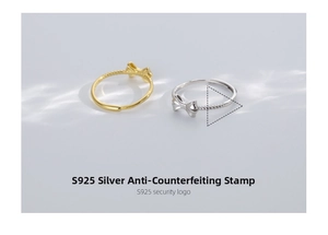 Macro detail of S925 sterling silver bow rings in gold and silver with twisted band texture