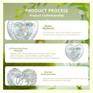 Close-up of S925 sterling silver heart charm with green enamel and unicorn motif