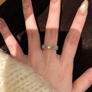 18k gold plated vintage zircon flower open ring on model hand with blue enamel detail