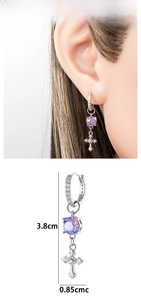 Detail view of purple zircon cross earring with 3.8cm height and 0.85cm width