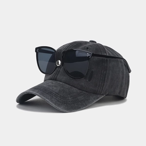 Washed dark gray vintage baseball cap with integrated sunglasses on the crown side view