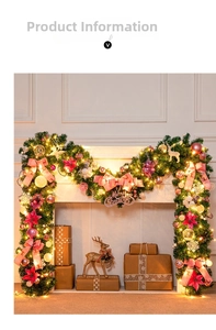 Detail of pink and gold Christmas garland with warm LED lights and Merry Christmas sign