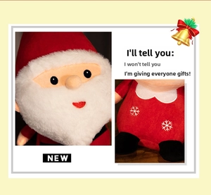 Detail of plush Santa Claus doll featuring white snowflake embroidery and soft white beard