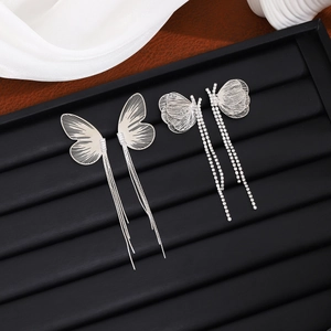 Elegant silver butterfly tassel earrings with sparkling crystals for special occasions