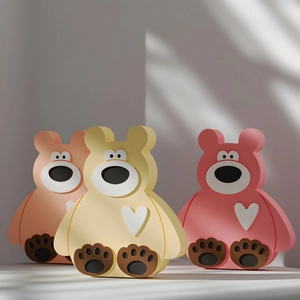 Three macaron-colored resin bears with heart motifs in artistic window shadow light