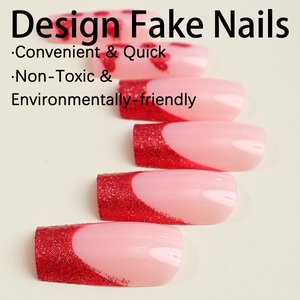 French tip press-on nails with red glitter gradients on a soft pink base