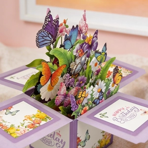 Detailed 3D pop-up card featuring colorful paper butterflies and blooming flowers