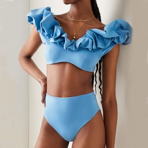 Detail of light blue bikini featuring ruffled off-shoulder top and high-waisted bottoms