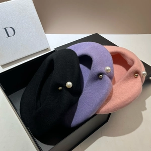 French style wool beret collection with elegant pearl details in a luxury gift box packaging