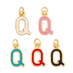 Close-up of five colorful enamel letter Q charms with gold-plated frames in a neat row