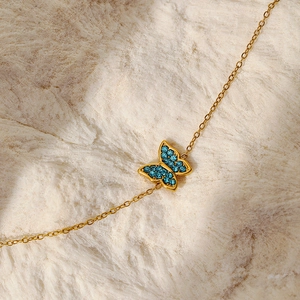 Elegant gold-plated stainless steel bracelet with a blue zircon butterfly pendant