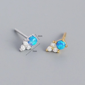 Sterling silver blue opal stud earrings with cubic zirconia in gold and silver finish