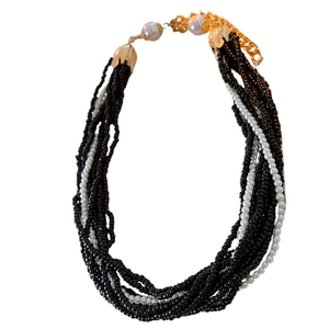 Multilayer faux pearl beaded necklace in black and white with gold-tone extension chain