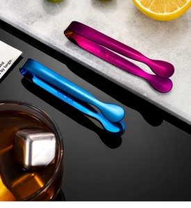 Detail of purple and blue 304 stainless steel sugar tongs for coffee and ice
