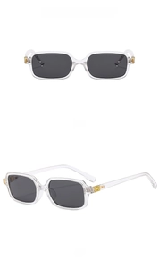 Front and side views of transparent rectangle sunglasses with gold logo detailing