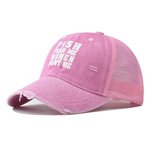 Detailed view of the pink distressed trucker hat with embroidered Fish Fear Me text