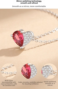 Detail shots of heart pendant with red cubic zirconia and nano-plated silver chain