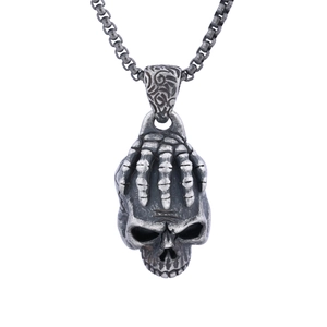 Gothic skull pendant necklace in antique silver finish with detailed relief and box chain