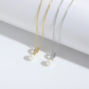 Gothic truck pendant necklaces in gold and silver finish with elegant white pearl charms