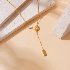 Gold-plated stainless steel Y-necklace with heart and rectangle charms on OT toggle chain