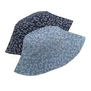Leopard print denim bucket hats in navy and light blue with a stylish washed texture