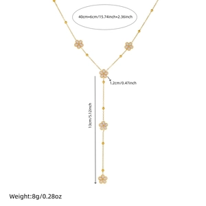 Collier élégant en Y doré avec des pétales de fleurs en perles et une longue chaîne