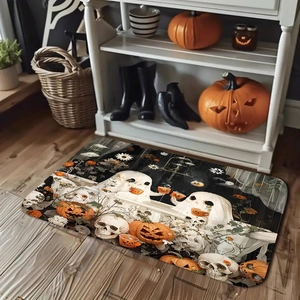 Close-up of Halloween diatom mud mat with skull and pumpkin patterns on wood floor