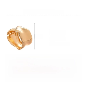 Detail view of a chunky gold irregular pleated bangle with 74g weight and size specs