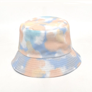 Macro detail of tie-dye bucket hat stitching and colorful macaron cotton fabric texture