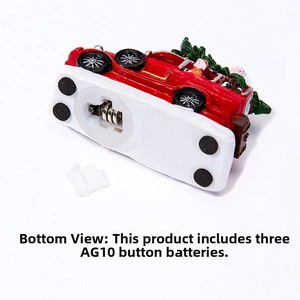 Detail view of the resin Christmas car base showing battery compartment and non-slip pads