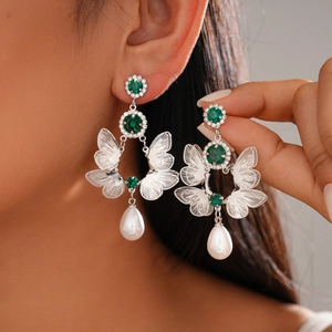 Silver butterfly drop earrings with green stones and white teardrop pearls